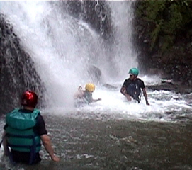  Jane (in yellow helmet) is bathing in waterfall